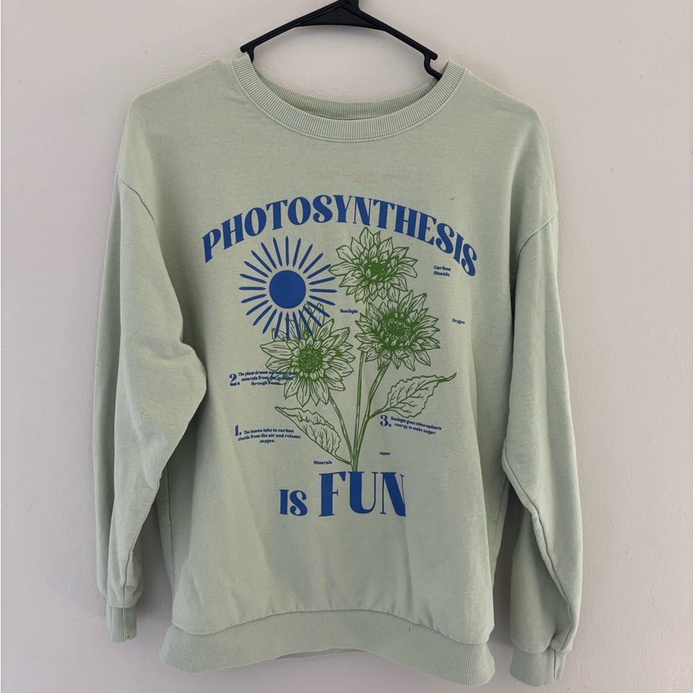Green Sweatshirt with Blue Graphic